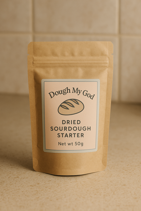 Kraft paper packaging of 'Dough My God' dried sourdough starter on a beige background