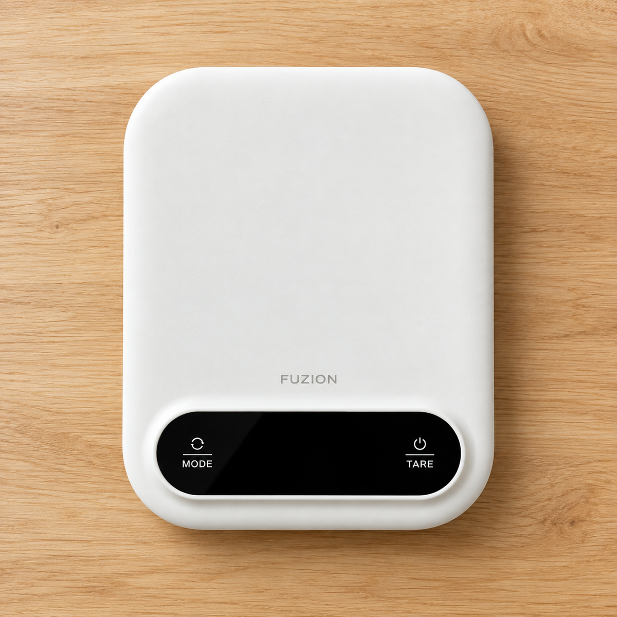 White digital kitchen scales on light timber
