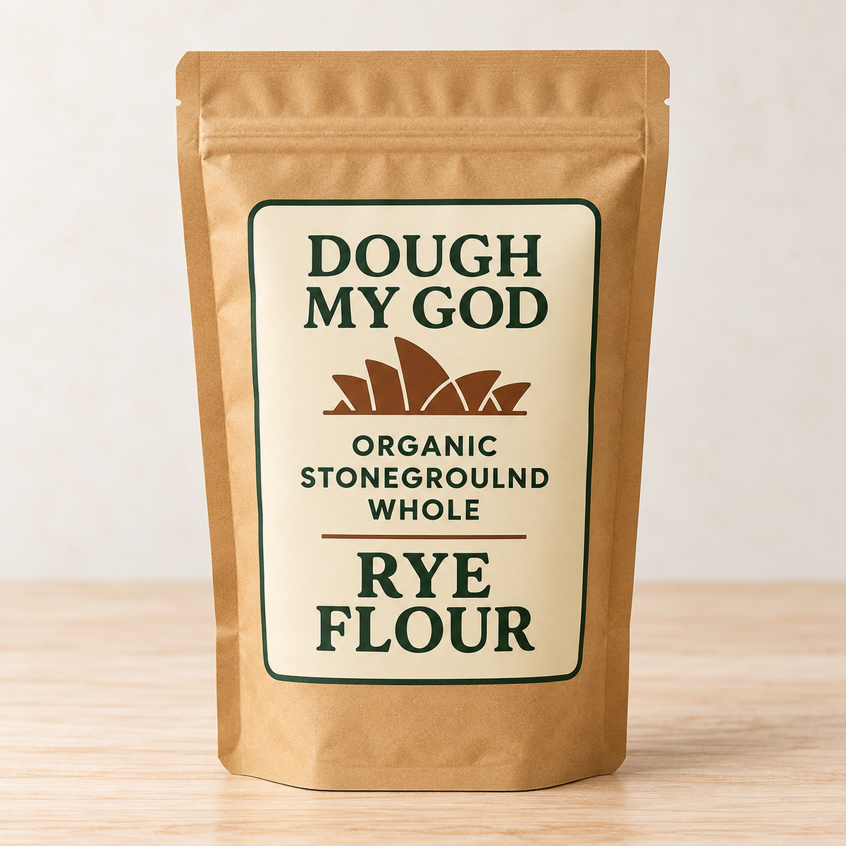 Dough My God organic stoneground whole rye flour pouch on a timber surface