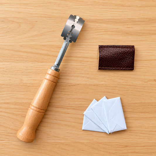 Traditional sourdough dough lame with wooden handle, leather blade cover and spare blades