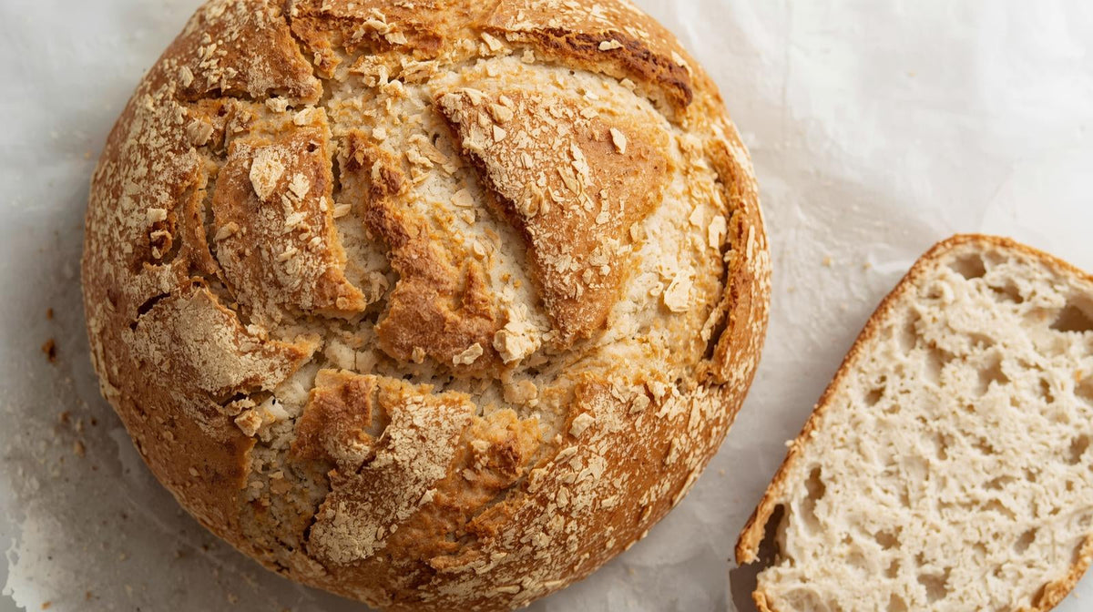 White gluten-free sourdough loaf and sliced crumb from the Dough My God White Bread Mix recipe