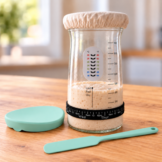 Sage sourdough starter care jar with thermometer, feeding band, linen cover and spatula
